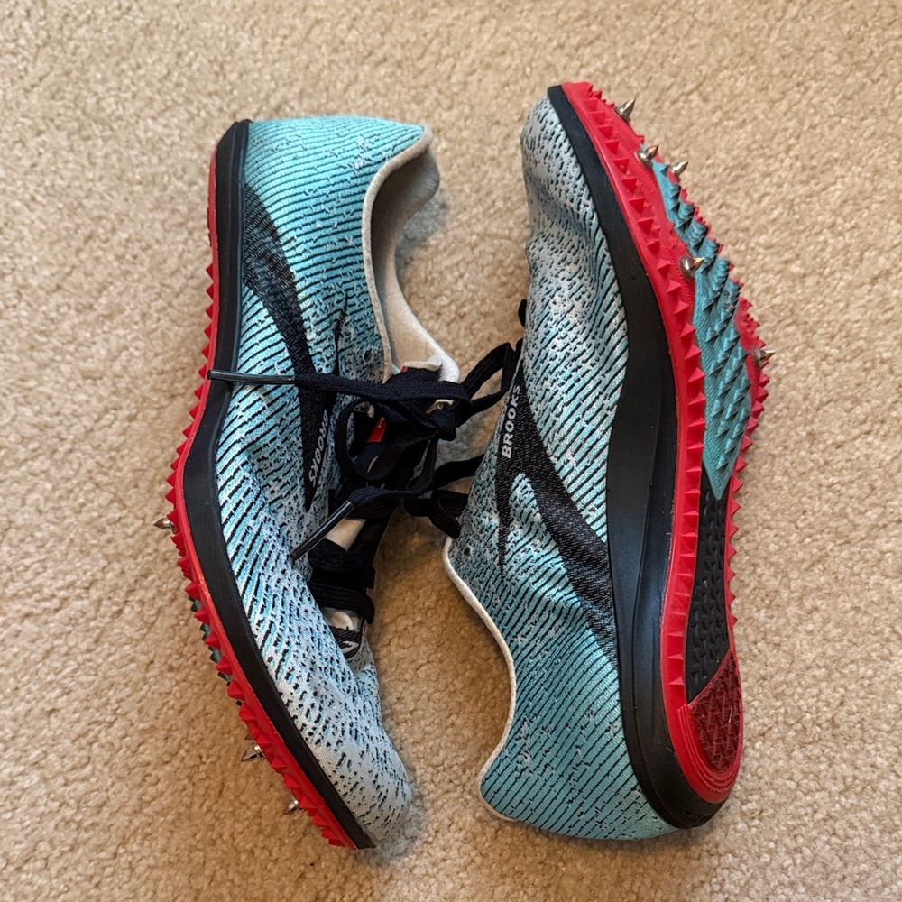 Brooks Turquoise and Red Running Spikes